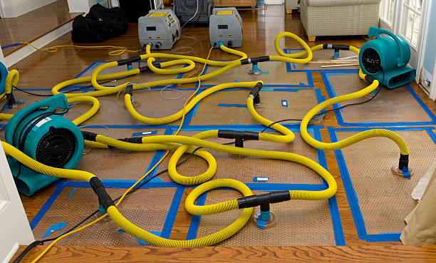 Professional Flood Damage Restoration technician working in Narragansett, RI
